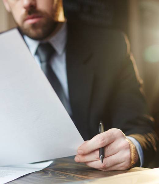 businessman-working-with-documentation-at-desk_02